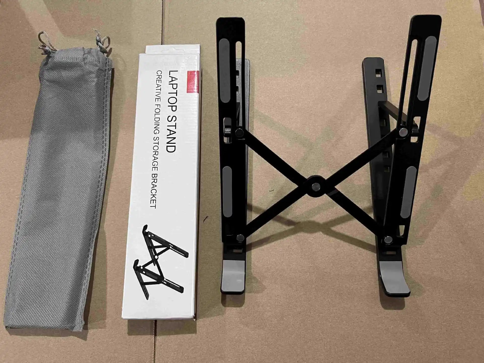 नि:शुल्क ढुवानी ल्यापटप स्ट्यान्ड एल्युमिनियम मिश्र धातु कम्प्युटर डेस्कटप ट्याब्लेट स्ट्यान्ड फोल्डिङ र लिफ्टिङ पोर्टेबल हीट डिसिपेशन ब्र्याकेट