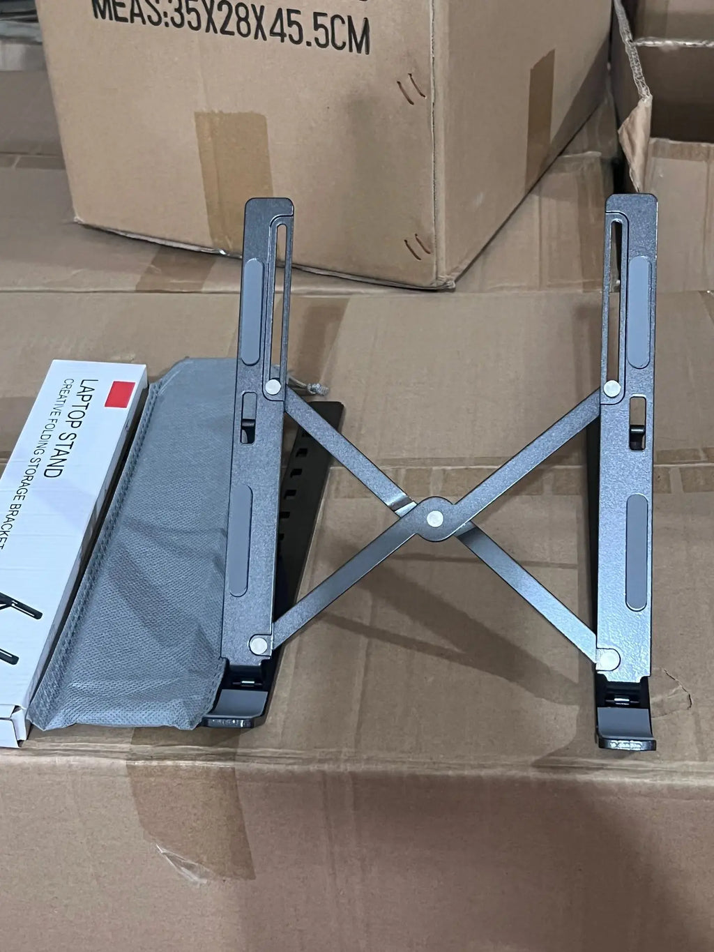 नि:शुल्क ढुवानी ल्यापटप स्ट्यान्ड एल्युमिनियम मिश्र धातु कम्प्युटर डेस्कटप ट्याब्लेट स्ट्यान्ड फोल्डिङ र लिफ्टिङ पोर्टेबल हीट डिसिपेशन ब्र्याकेट